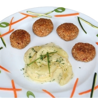 Geschmorte Gurke mit Dinkel-Bällchen